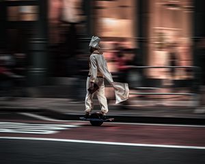Preview wallpaper man, hoverboard, street, city, road