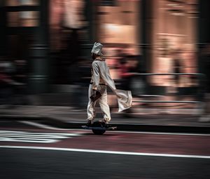 Preview wallpaper man, hoverboard, street, city, road