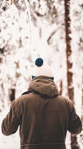 Preview wallpaper man, jacket, winter, forest
