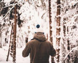 Preview wallpaper man, jacket, winter, forest