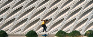 Preview wallpaper man, jump, electric unicycle, skate, trick, building