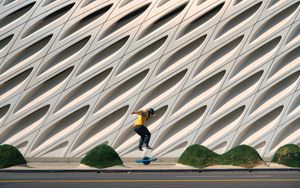 Preview wallpaper man, jump, electric unicycle, skate, trick, building