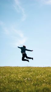 Preview wallpaper man, jump, freedom, free, field, nature