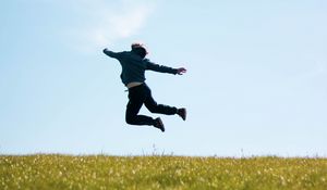 Preview wallpaper man, jump, freedom, free, field, nature