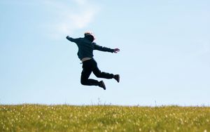 Preview wallpaper man, jump, freedom, free, field, nature