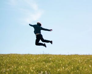 Preview wallpaper man, jump, freedom, free, field, nature