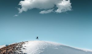 Preview wallpaper man, jump, hill, snow, sky