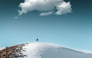 Preview wallpaper man, jump, hill, snow, sky