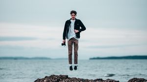 Preview wallpaper man, jump, levitation, sea, coast