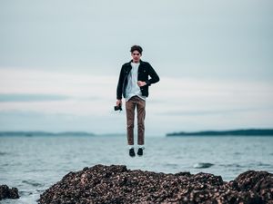Preview wallpaper man, jump, levitation, sea, coast
