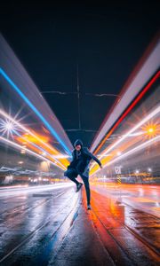 Preview wallpaper man, jump, night city, long exposure