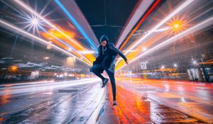Preview wallpaper man, jump, night city, long exposure