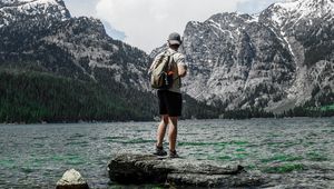 Preview wallpaper man, lake, mountains, nature, alone