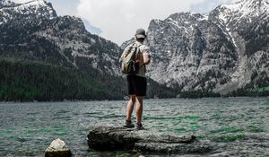 Preview wallpaper man, lake, mountains, nature, alone