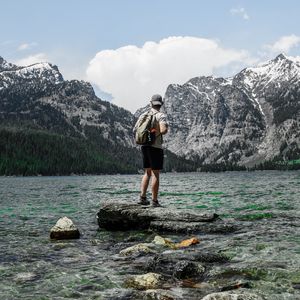 Preview wallpaper man, lake, mountains, nature, alone