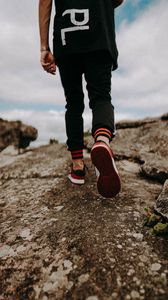 Preview wallpaper man, legs, walk, rocks