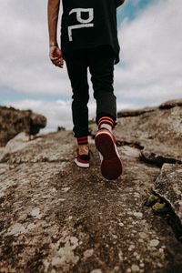 Preview wallpaper man, legs, walk, rocks