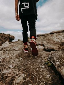 Preview wallpaper man, legs, walk, rocks