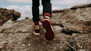Preview wallpaper man, legs, walk, rocks