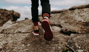 Preview wallpaper man, legs, walk, rocks