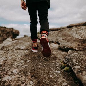 Preview wallpaper man, legs, walk, rocks