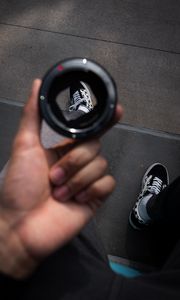 Preview wallpaper man, lens, sneakers, distortion