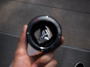 Preview wallpaper man, lens, sneakers, distortion