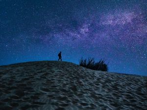 Preview wallpaper man, loneliness, alone, sand, starry sky