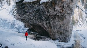 Preview wallpaper man, loneliness, alone, rocks, snowy