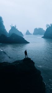 Preview wallpaper man, loneliness, alone, rocks, sea, fog