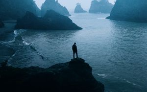 Preview wallpaper man, loneliness, alone, rocks, sea, fog