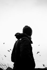 Preview wallpaper man, loneliness, alone, bw, birds