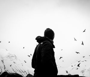 Preview wallpaper man, loneliness, alone, bw, birds