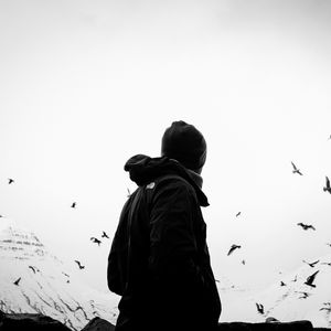 Preview wallpaper man, loneliness, alone, bw, birds