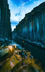 Preview wallpaper man, loneliness, alone, rocks, river