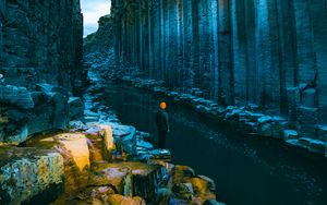 Preview wallpaper man, loneliness, alone, rocks, river