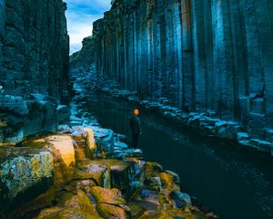 Preview wallpaper man, loneliness, alone, rocks, river