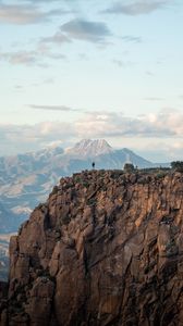 Preview wallpaper man, loneliness, alone, rock, mountains