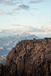 Preview wallpaper man, loneliness, alone, rock, mountains