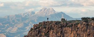 Preview wallpaper man, loneliness, alone, rock, mountains