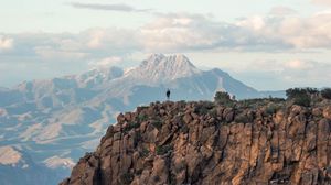 Preview wallpaper man, loneliness, alone, rock, mountains