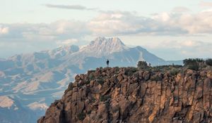 Preview wallpaper man, loneliness, alone, rock, mountains