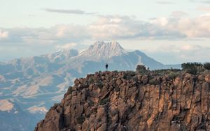 Preview wallpaper man, loneliness, alone, rock, mountains