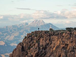 Preview wallpaper man, loneliness, alone, rock, mountains