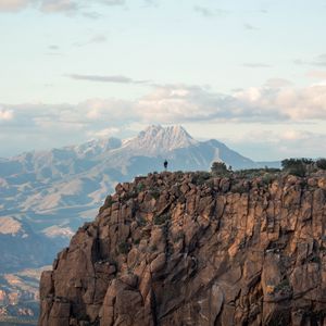 Preview wallpaper man, loneliness, alone, rock, mountains