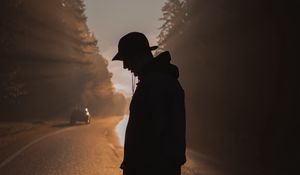 Preview wallpaper man, loneliness, alone, silhouette, rays