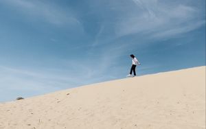 Preview wallpaper man, loneliness, alone, sand, slope