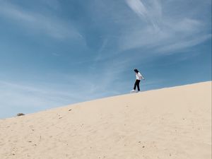 Preview wallpaper man, loneliness, alone, sand, slope