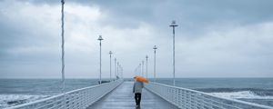 Preview wallpaper man, loneliness, alone, pier, umbrella