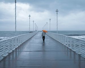 Preview wallpaper man, loneliness, alone, pier, umbrella